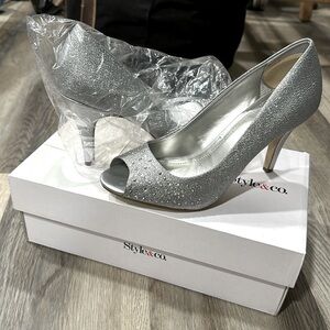 Sparkly silver heals never worn.